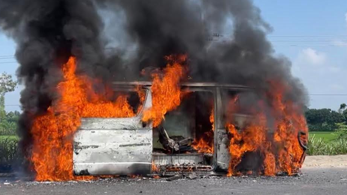 BNP activists carrying microbus set on fire in Natore